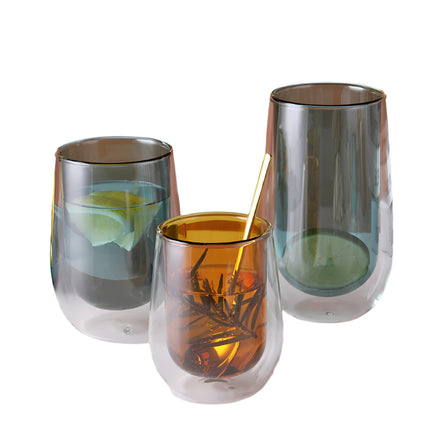 Elegant double-layer colored glass cup made of high borosilicate with heat resistance, available in transparent, lake green, and amber, in various sizes.