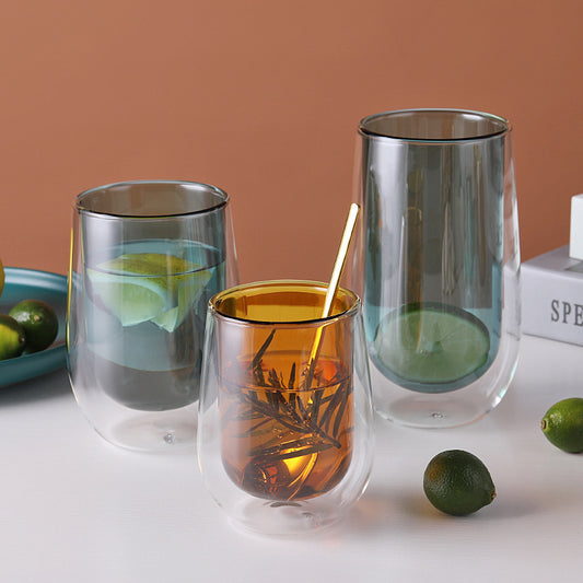 Elegant double-layer colored glass cup made of high borosilicate with heat resistance, available in transparent, lake green, and amber, in various sizes.
