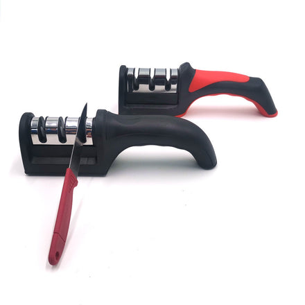 Compact kitchen knife sharpener with a modern, simple design made from durable plastic, designed for fast and easy blade sharpening at home.