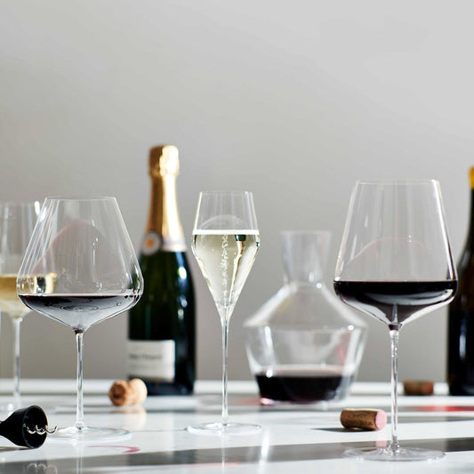Luxurious retro crystal glass collection featuring a Bordeaux wine glass (765ml), Burgundy wine glass (960ml), all-purpose glass (530ml), white wine glass (400ml), and Champagne glass (200ml), each with a unique tiny bubble finish for a light luxury look.