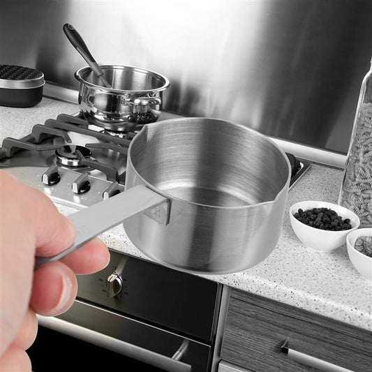 Image of the PrecisionBake Stainless Steel Measuring Cup, a sleek modern kitchen tool in a silver-gray finish featuring a bright, easy-pour mouth, available in 60ml and 80ml sizes for precise measurements.