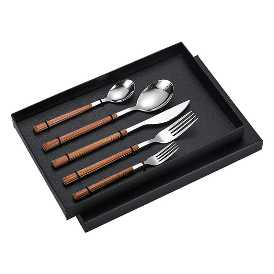 Elegant stainless steel cutlery set featuring a wood grain handle, including one knife, two forks, and two spoons with a mirror-polished finish.
